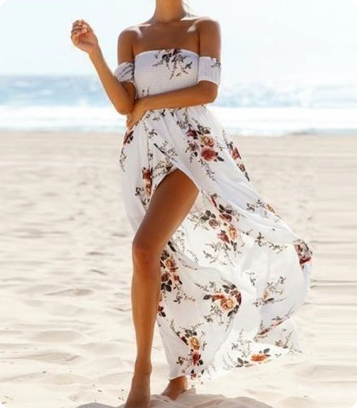 mulher de vestido na praia